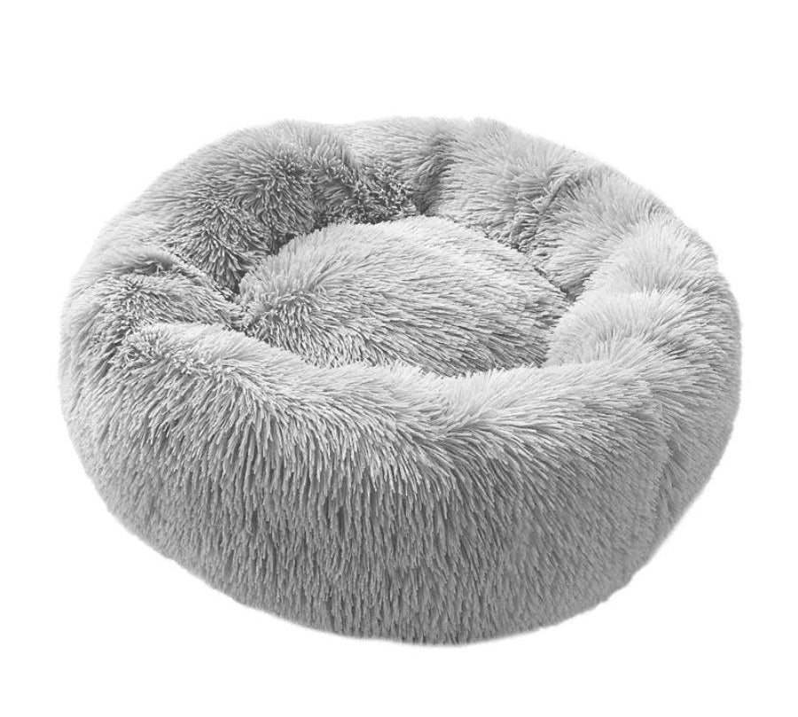Cama Antiestrés para Perros y Gatos 100cm, felpa suave y base impermeable. Ideal para reducir la ansiedad y proporcionar un descanso cómodo y seguro.