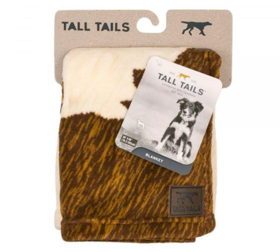 Manta Polar Cowhide L, suave y acogedora, ideal para mascotas pequeñas. Protege muebles, fácil de lavar, y perfecta para viajes. Dimensiones 76 x 102 cm.