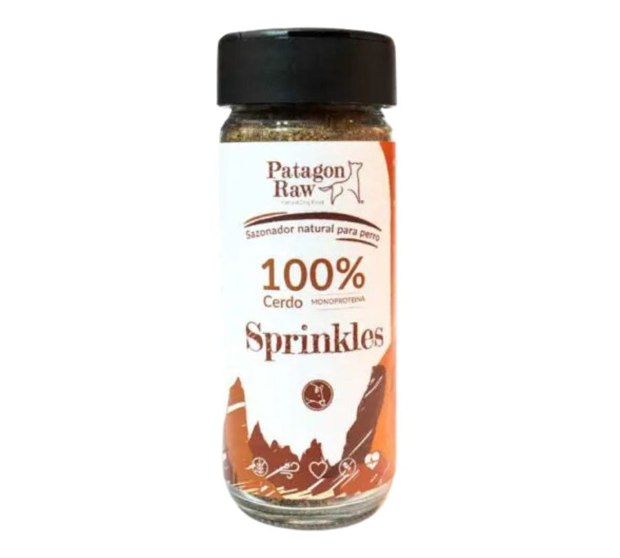 Patagon Raw Sprinkles Sabor Cerdo, un sazonador natural y libre de granos para perros. Perfecto para complementar su dieta y añadir sabor. 🐶🌟