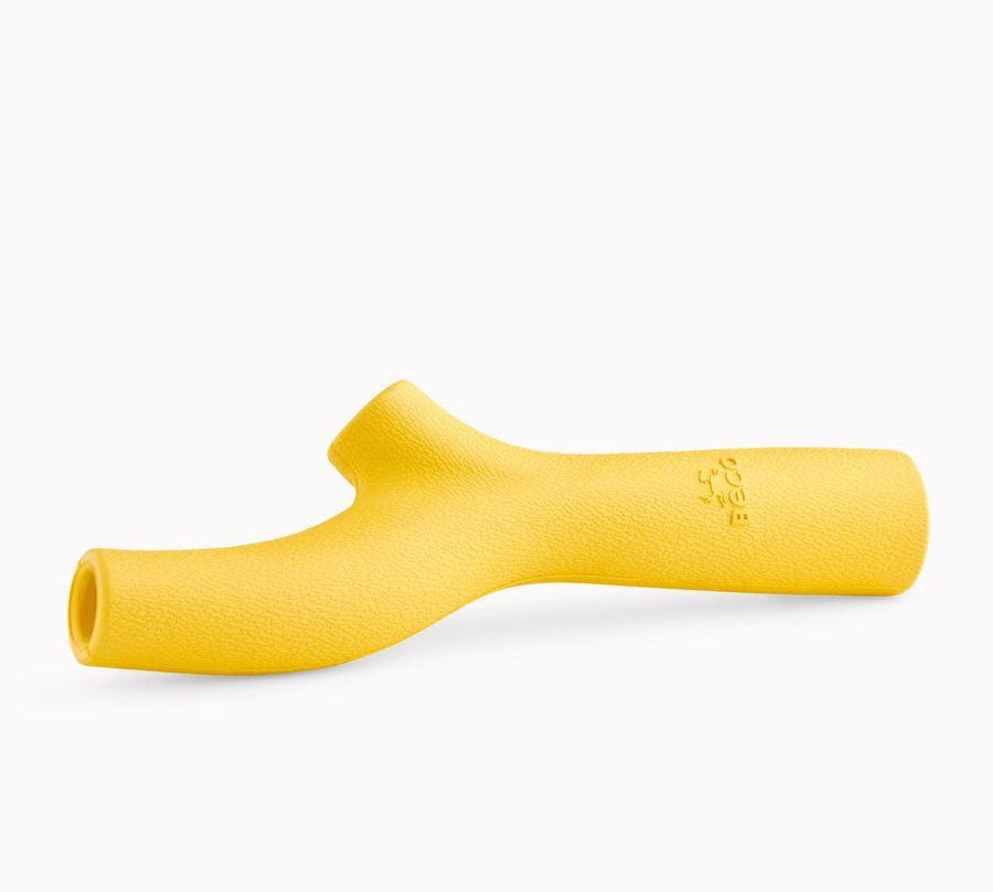 Super Stick Goma Natural, juguete resistente y seguro para perros. Hecho de goma natural, ideal para masticación y juegos interactivos. Disponible en colores brillantes.